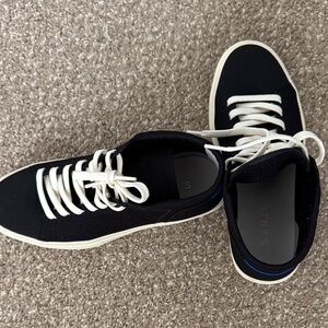 Rothy's Black Sneakers with White and Blue Details